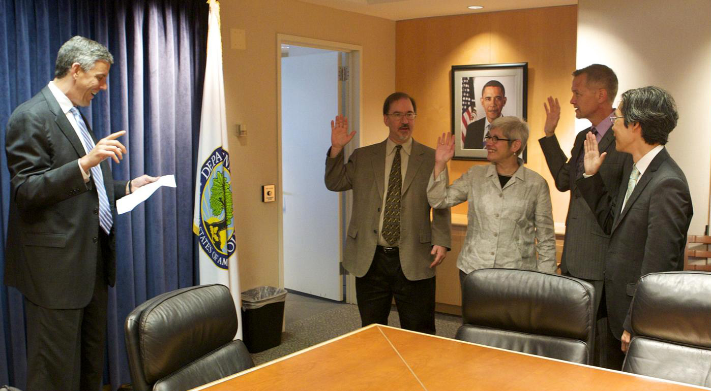 Dean David Chard and others being sworn in by U.S. Secretary of Education Arne Duncan